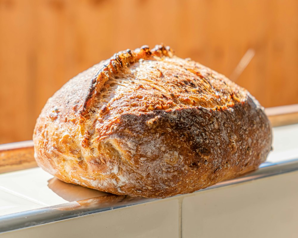Round loaf scored and dusted with flour