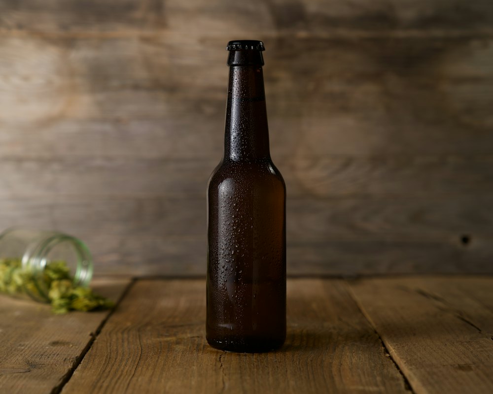 Bottle of sparkling cider with two glasses
